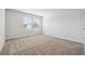Spacious bedroom featuring plush carpeting and lots of natural light at 345 Orwell Dr, Social Circle, GA 30025