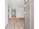 View of a freshly painted entryway of a new home with light-colored wood floors at 345 Orwell Dr, Social Circle, GA 30025
