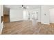 Living room view with staircase, open layout, and light-colored floors at 345 Orwell Dr, Social Circle, GA 30025