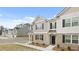 Charming exterior townhome features brick accents and well-maintained landscaping at 456 Reflection Dr # 20, Stockbridge, GA 30281