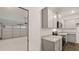 Kitchen featuring stone countertops, stainless appliances, and seamless access to garage at 456 Reflection Dr # 20, Stockbridge, GA 30281