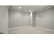 A small bedroom with carpet and neutral paint color at 627 Warsaw Rd, Roswell, GA 30075