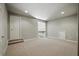 Bonus room with neutral carpet, white trim and doors and recessed lighting at 627 Warsaw Rd, Roswell, GA 30075