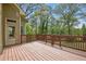 Outdoor deck overlooks the spacious backyard, perfect for outdoor dining and relaxation at 627 Warsaw Rd, Roswell, GA 30075