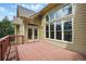 Large wooden deck off the back of the home, perfect for entertaining guests or relaxing outdoors at 627 Warsaw Rd, Roswell, GA 30075