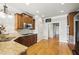 Kitchen with granite countertops, stainless steel appliances, and hardwood floors at 627 Warsaw Rd, Roswell, GA 30075