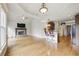 Open concept living area and kitchen with fireplace at 627 Warsaw Rd, Roswell, GA 30075