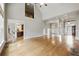 Open floor plan with hardwood floors and arched doorways at 627 Warsaw Rd, Roswell, GA 30075