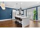 Spacious kitchen with a marble island, stainless steel appliances, and hardwood floors at 818 Highland Green Ne Way # 818, Atlanta, GA 30306