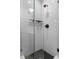 Modern shower features white subway tile, a glass door, and a black shower head at 818 Highland Green Ne Way # 818, Atlanta, GA 30306