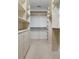 Large walk-in closet featuring an abundance of shelving and storage space, great for organization at 818 Highland Green Ne Way # 818, Atlanta, GA 30306