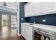 Wet bar with custom cabinetry and a beverage fridge at 818 Highland Green Ne Way # 818, Atlanta, GA 30306