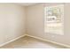 Bedroom with natural light and view of the outdoors at 8199 Cousins St, Douglasville, GA 30134