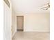 Open living area with neutral paint, wood-look flooring, and bright natural light at 8199 Cousins St, Douglasville, GA 30134
