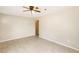 Bright room with modern flooring, neutral paint, and ceiling fan at 8199 Cousins St, Douglasville, GA 30134
