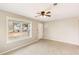 Inviting space with tile flooring, a ceiling fan, and a sunlit window at 8199 Cousins St, Douglasville, GA 30134