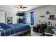 Comfortable bedroom featuring a large bed, a dresser, and neutral-colored walls at 15 Mary Jane Ln, Covington, GA 30016