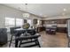 Eat-in kitchen with a dining table, stylish cabinetry, and stainless steel appliances at 15 Mary Jane Ln, Covington, GA 30016