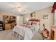 Bedroom with soft carpet, neutral walls and furniture, ceiling fan and two windows at 370 Fairleaf Ct, Alpharetta, GA 30022