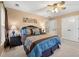 Bedroom with soft carpet, neutral walls and furniture, ceiling fan and two windows at 370 Fairleaf Ct, Alpharetta, GA 30022