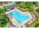 Overhead shot of a community pool area complete with a uniquely shaped pool and ample lounge seating for residents at 370 Fairleaf Ct, Alpharetta, GA 30022