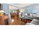 Comfortable living room with hardwood floors and view into formal dining area at 370 Fairleaf Ct, Alpharetta, GA 30022