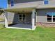 Spacious covered back porch with brick accents, ideal for outdoor relaxation and entertaining at 3818 Southfield Ct, Loganville, GA 30052