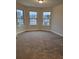 Bedroom with multiple windows providing lots of natural light at 3818 Southfield Ct, Loganville, GA 30052
