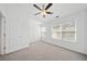 Spacious bedroom with large windows providing natural light and plush carpet at 1245 Liberty Nw Pkwy # 807, Atlanta, GA 30318