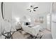 Bright bedroom with plush carpet, ceiling fan, and a large window with natural light at 1245 Liberty Nw Pkwy # 807, Atlanta, GA 30318