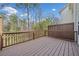 A wooden deck offers a private view of the surrounding trees and sky at 1245 Liberty Nw Pkwy # 807, Atlanta, GA 30318