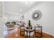 Open-concept dining area with hardwood floors, stylish furniture, and natural light at 1245 Liberty Nw Pkwy # 807, Atlanta, GA 30318