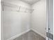 Walk in closet with installed wired shelving for organization at 5520 Morning Creek Cir, Atlanta, GA 30349