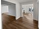 Bright living room featuring rich wood flooring and open floor plan at 5520 Morning Creek Cir, Atlanta, GA 30349