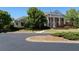 Clubhouse featuring classic Greek architecture, including pillars at 837 Lakemont Dr, Canton, GA 30114