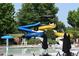 Have a blast at the community pool featuring a colorful water slide and plenty of seating at 837 Lakemont Dr, Canton, GA 30114