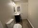 This bathroom offers a single vanity and toilet at 2992 Parc Lorraine, Lithonia, GA 30038