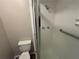 This bathroom offers a toilet with a modern walk-in shower at 2992 Parc Lorraine, Lithonia, GA 30038