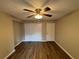 The bedroom features hardwood floors and closet space at 2992 Parc Lorraine, Lithonia, GA 30038
