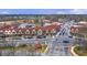 Aerial view of business district, showcasing pedestrian-friendly streets and red-roofed Tudor style buildings at 3207 Kensington Rd, Avondale Estates, GA 30002