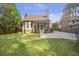 View of a screened-in porch, and meticulously maintained lawn with a privacy fence at 3207 Kensington Rd, Avondale Estates, GA 30002
