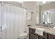 Bathroom featuring granite countertops, shower with curtain and toilet at 3207 Kensington Rd, Avondale Estates, GA 30002