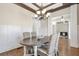 Dining room with wainscoting, coffered ceiling, and a view into the kitchen at 3207 Kensington Rd, Avondale Estates, GA 30002