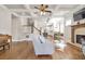 Spacious living room with fireplace, hardwood floors and an open concept design at 3207 Kensington Rd, Avondale Estates, GA 30002