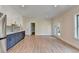 Kitchenette featuring sleek stainless steel appliances, ample counter space, and natural light at 5533 Addison Woods Pl, Buford, GA 30518