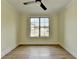 Office space with luxury vinyl floors and window bringing in an abundance of natural light at 5533 Addison Woods Pl, Buford, GA 30518