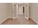 Bright room with double doors and view of shelving at 5533 Addison Woods Pl, Buford, GA 30518