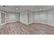 Large open room with glass door at 5533 Addison Woods Pl, Buford, GA 30518