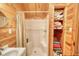 Clean bathroom showcasing a shower with shelves and a vanity at 5642 N Highway 212, Covington, GA 30016