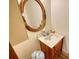 Charming bathroom featuring a decorative mirror and unique sink at 5642 N Highway 212, Covington, GA 30016